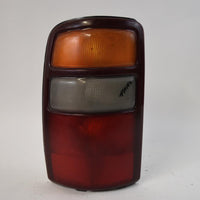2000-2006 CHEVY TAHOE DRIVER LEFT SIDE REAR TAIL LIGHT 16525375 - BIGGSMOTORING.COM