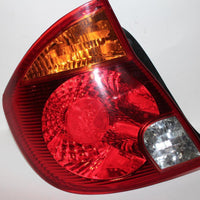 2003-2005 Hyundai Accent Hatchback Driver Side Rear Tail Light 28282 - BIGGSMOTORING.COM