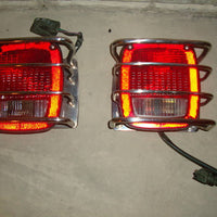 87-06 JEEP WRANGLER TAILLIGHTS W/ GUARD FREE CHROME GAS